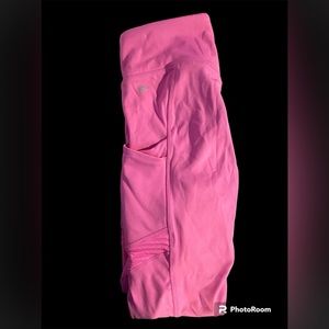 Pink Fabletics leggings with pockets, breathable sides